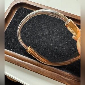 Elegant Silver and Gold Bangle Bracelet